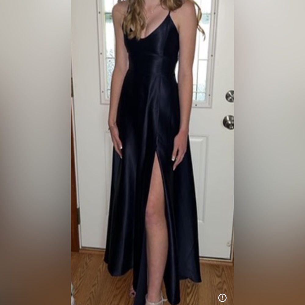 Floor length, navy prom dress.